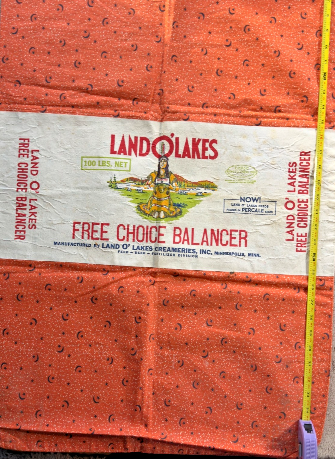 Land O' Lakes Free Choice Balancer package with a measuring tape on top