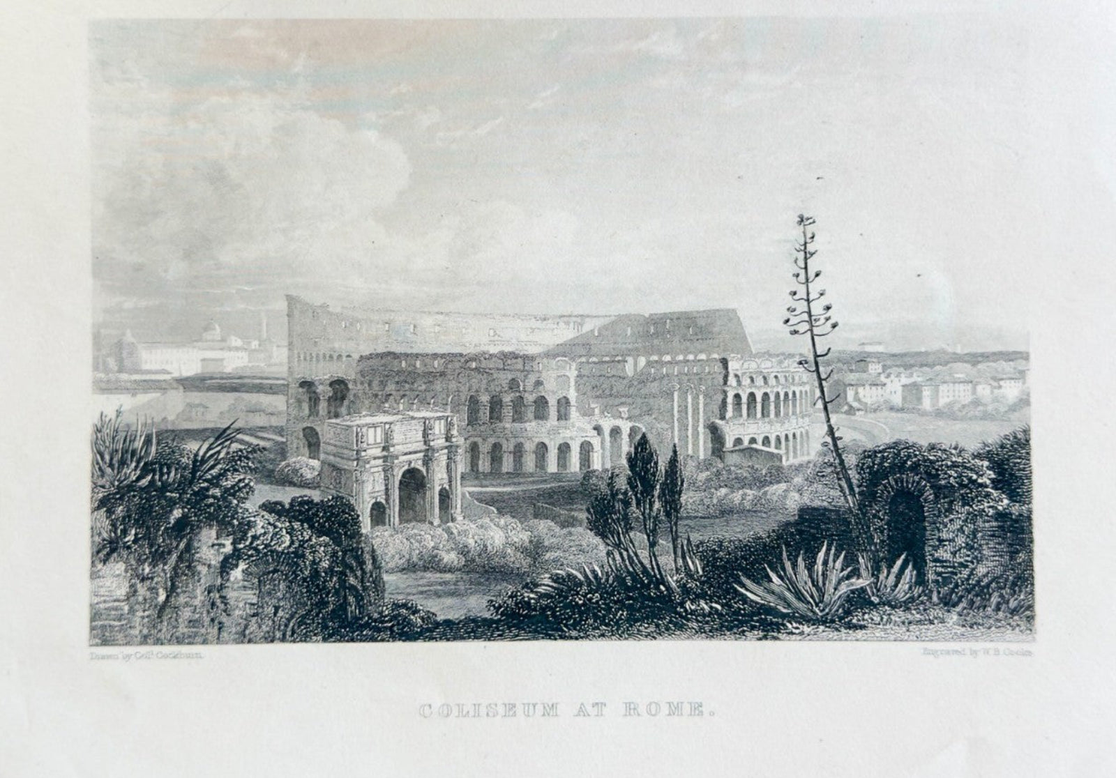 Vintage black and white print of a classical building with decorative elements, framed in a wooden box.