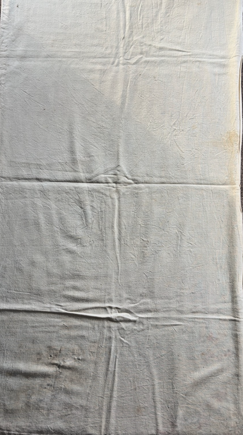 Textured gray fabric with visible creases