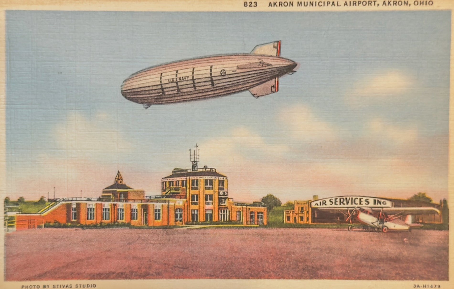 Illustration of a blimp over a building with 'Air Services Inc.' on a vintage-style postcard.