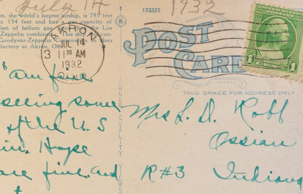 Vintage postcard with handwritten text, postage stamp, and postal markings from 1932.