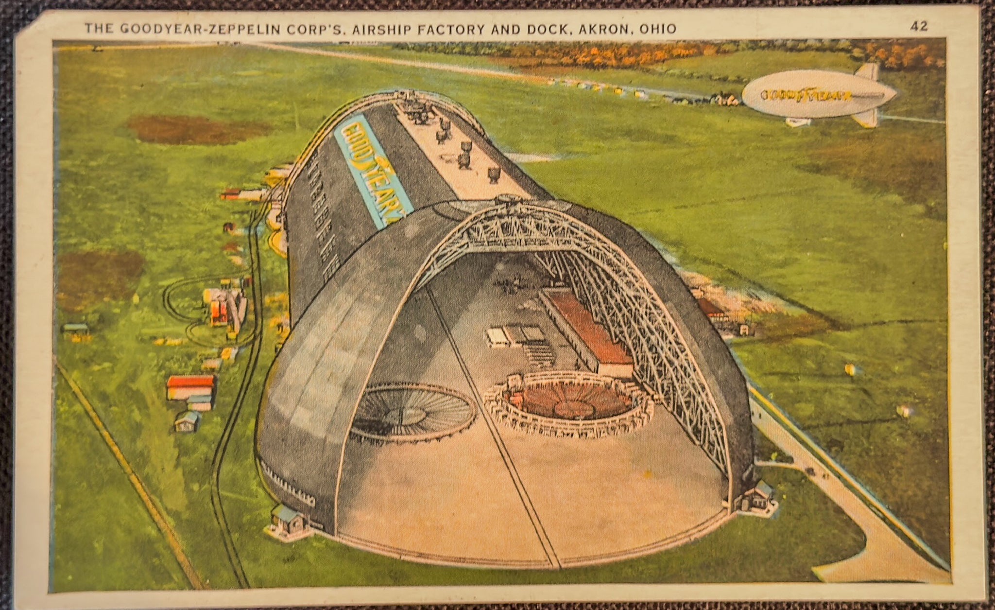 U.S.S. Akron in Flight Postcard Goodyear-Zeppelin Hangar Airship U.S. Navy