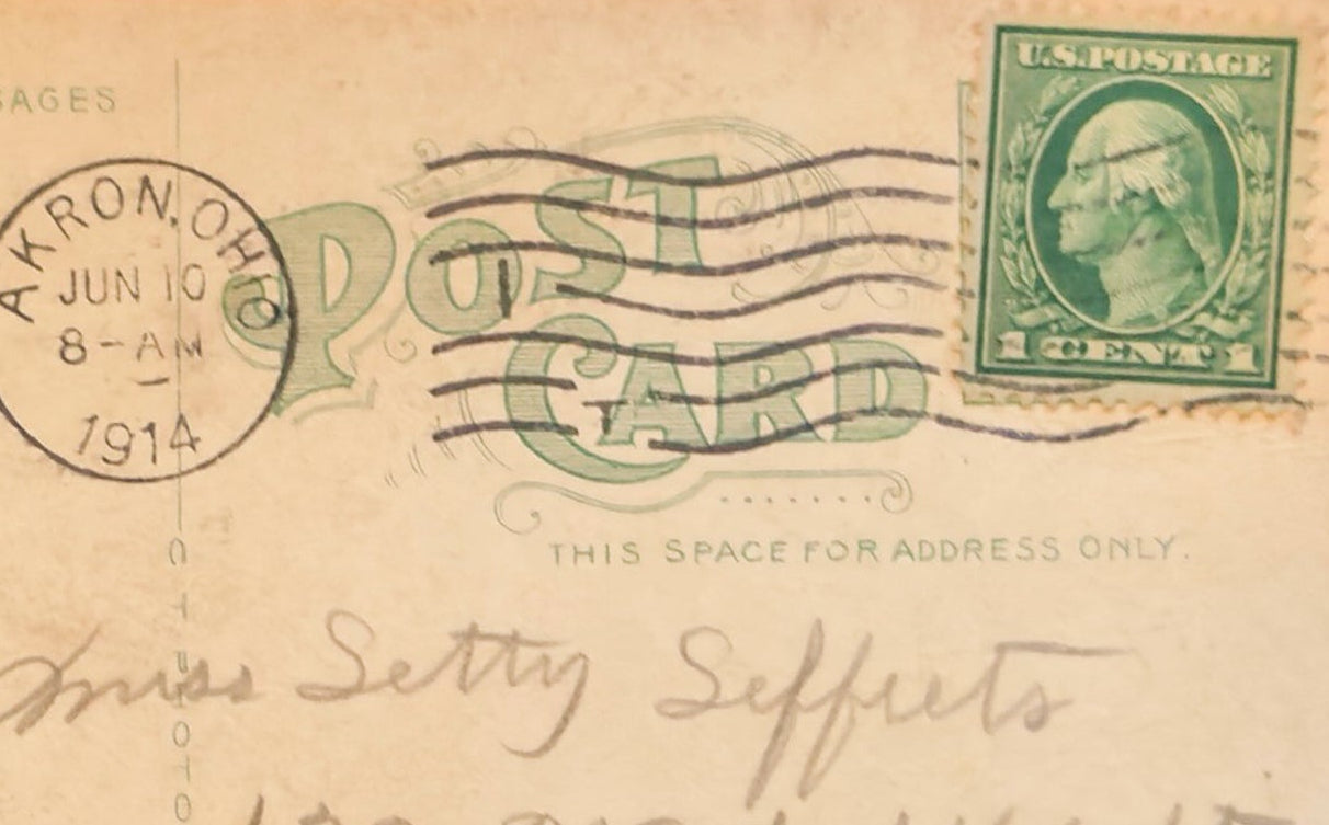 Vintage postcard with postage stamp and postmark, featuring handwritten text.