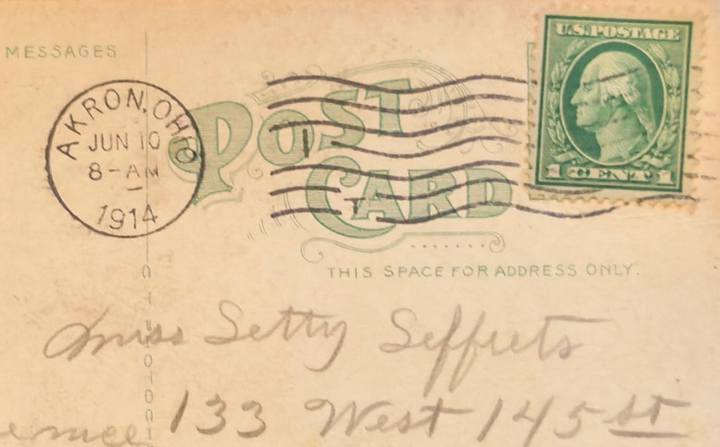 Vintage postcard with postage stamp and postmark, featuring handwritten text.