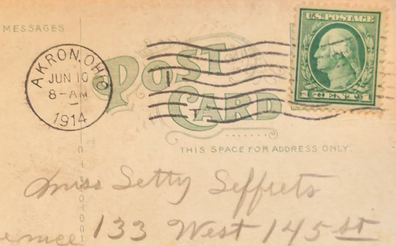Vintage postcard with postage stamp and postmark, featuring handwritten text.