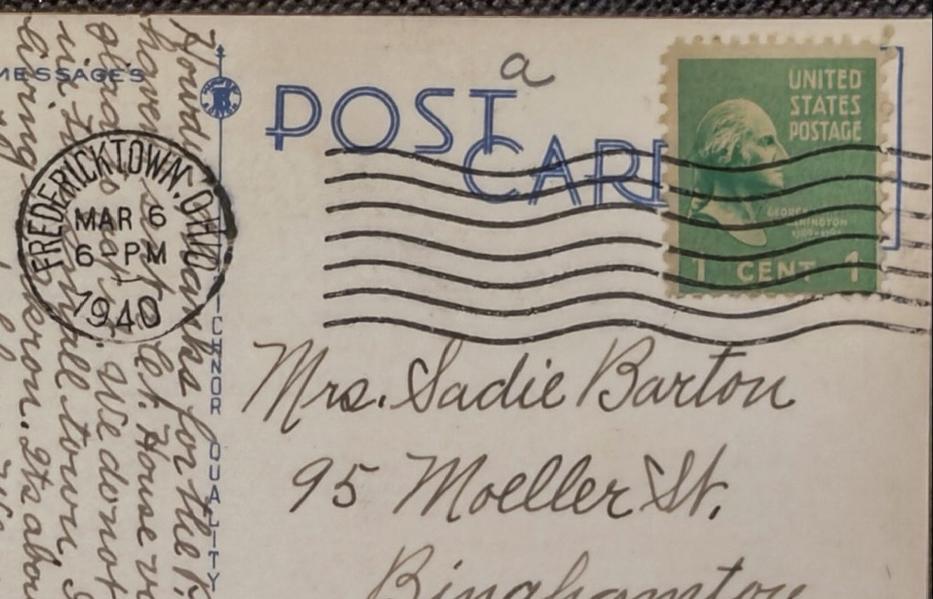 Vintage postcard with handwritten text, postage stamp, and postmark.