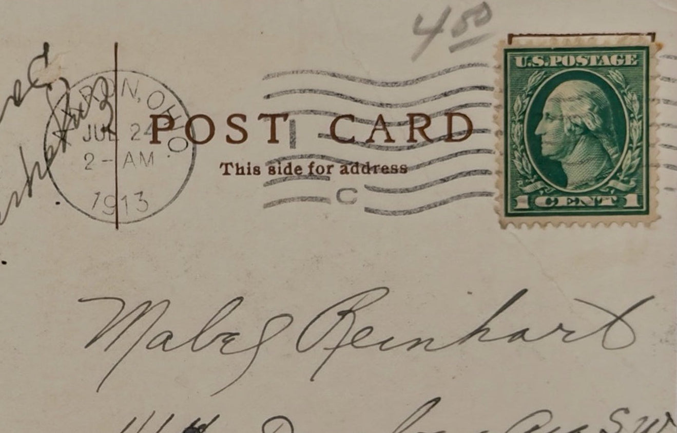 Vintage postcard with postage stamp and handwritten text