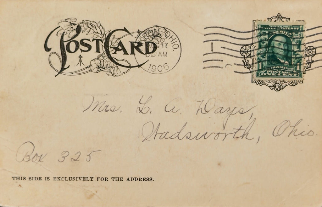 Vintage postcard with postage stamp and address text