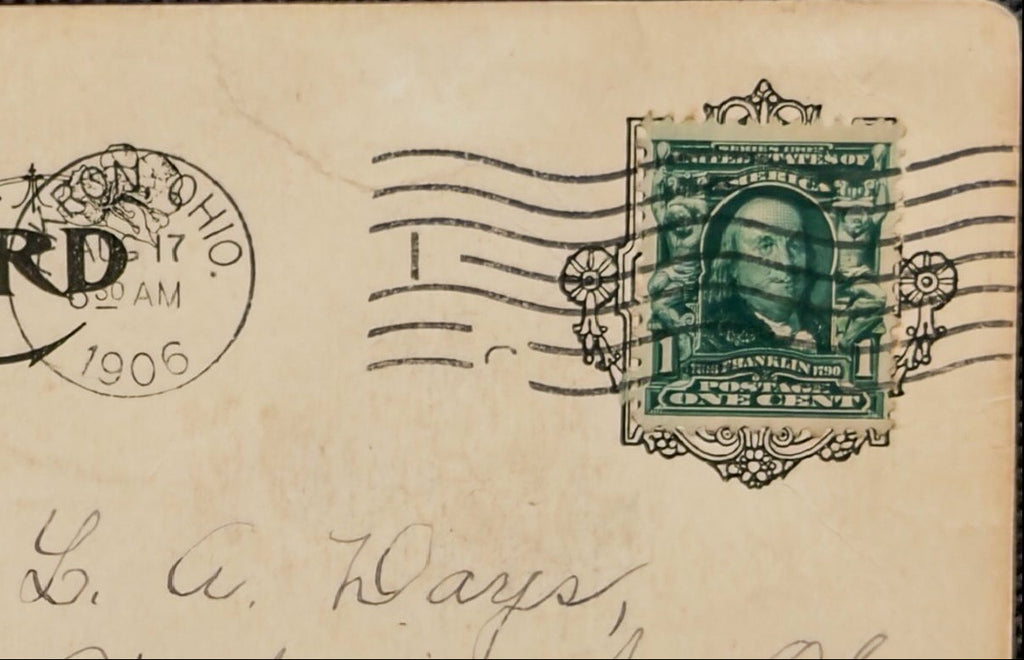 Vintage postcard with postage stamp and address text