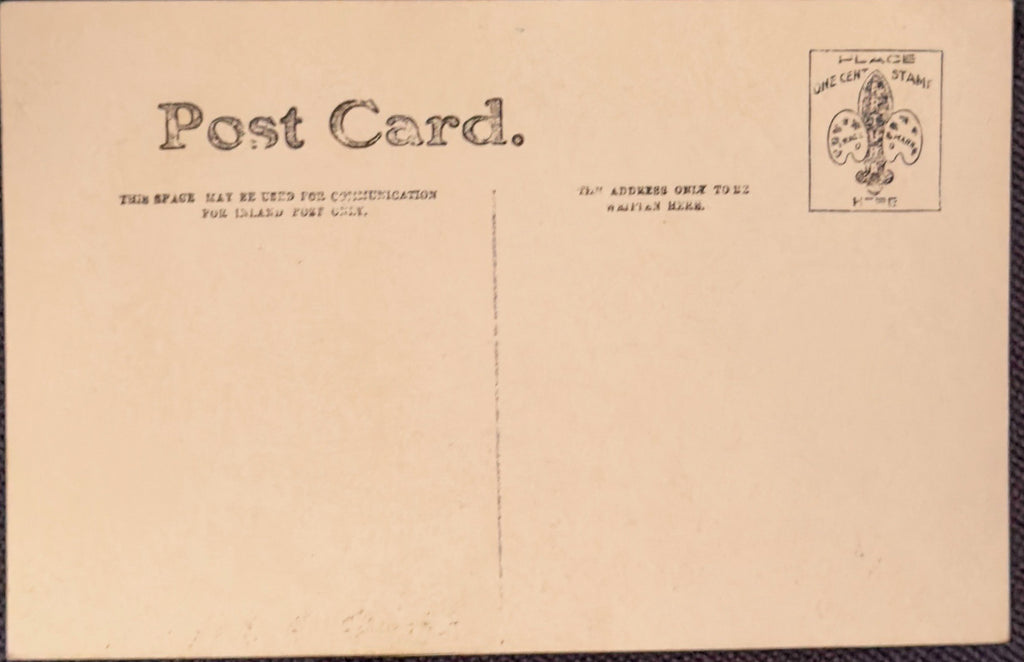 Back of a vintage postcard with text and a logo.