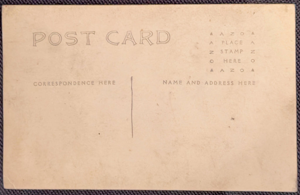 Back of a vintage postcard with pre-printed text for correspondence and address.