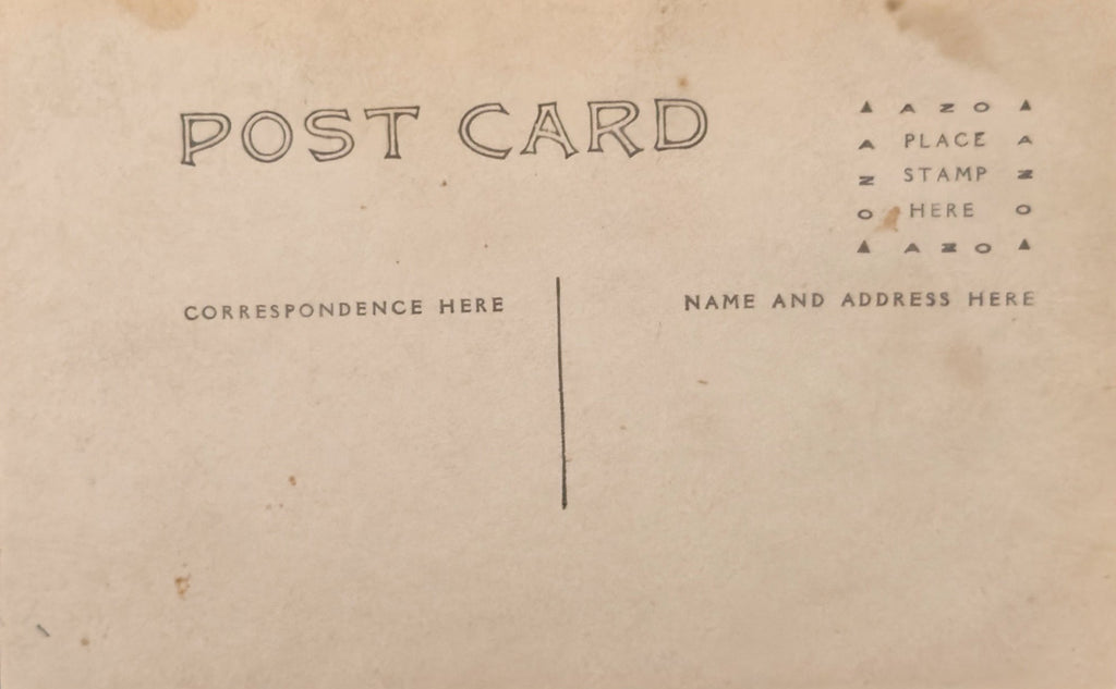 Vintage postcard with typewritten text on a beige background