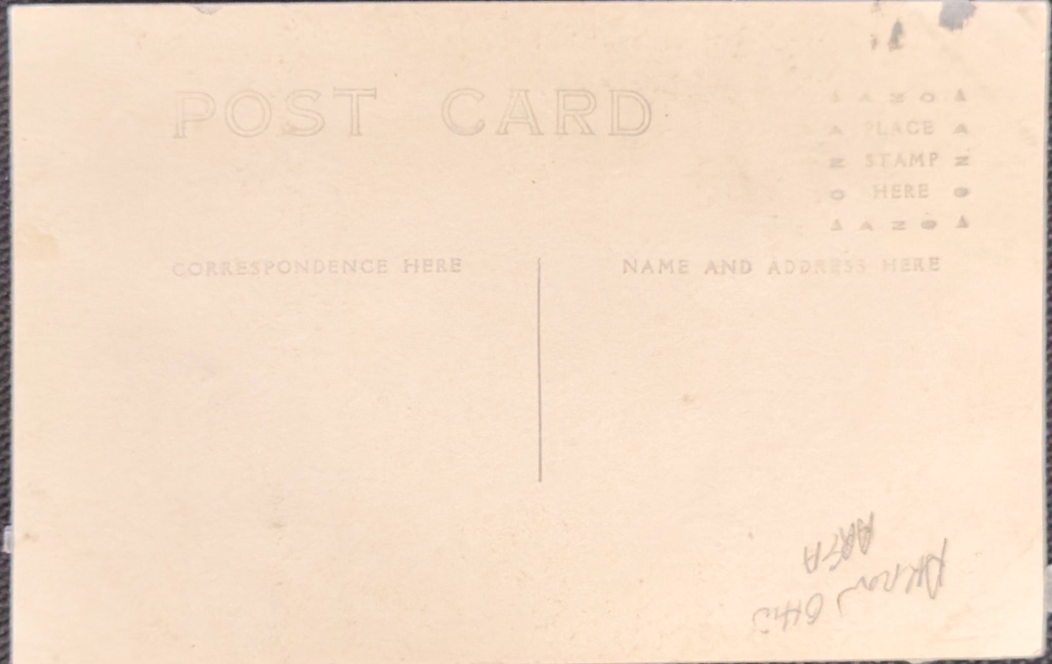 Back of a vintage postcard with 'POST CARD' and 'NAME AND ADDRESS HERE' text.