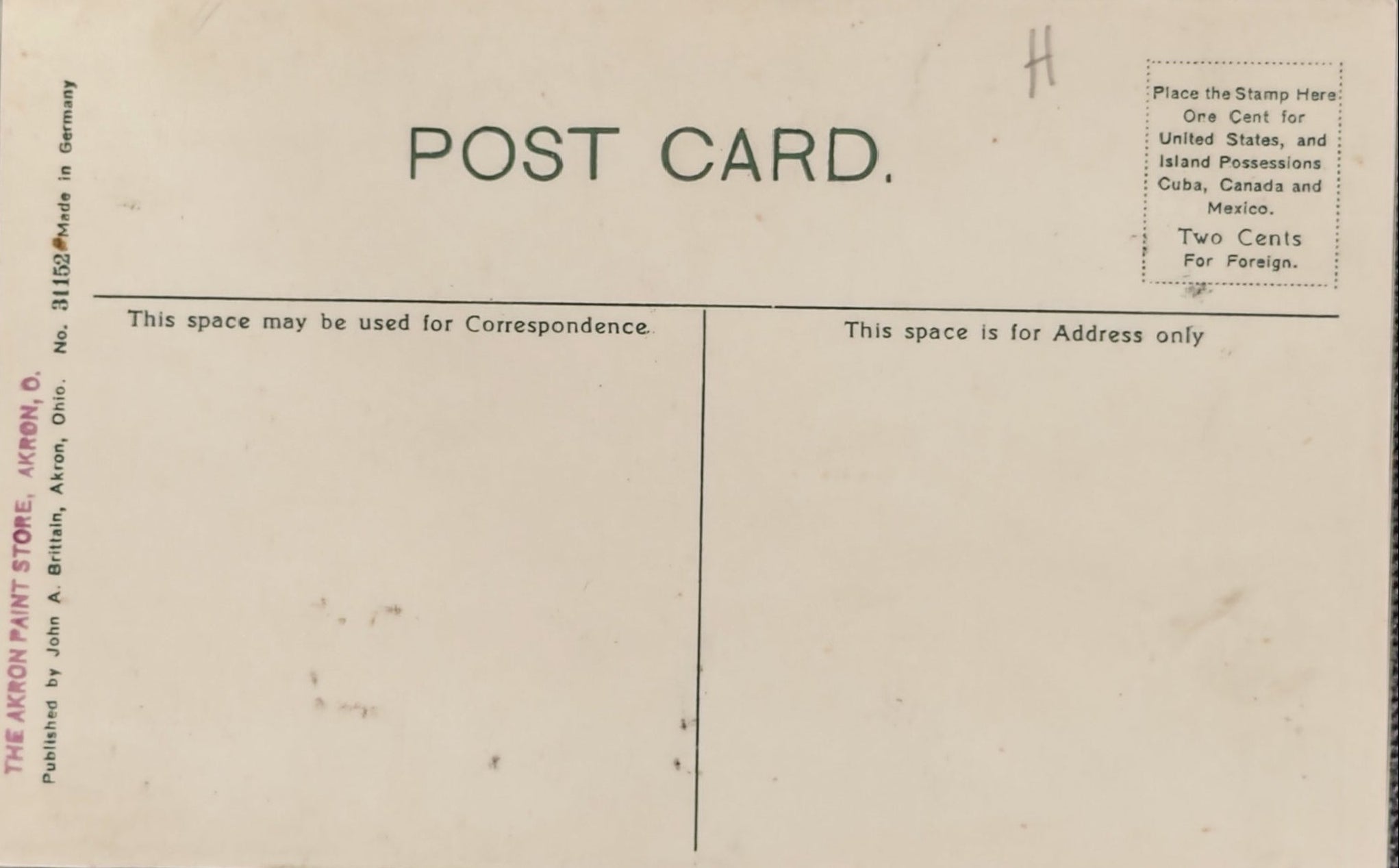 Back of a vintage postcard with typewritten text and a grid layout.