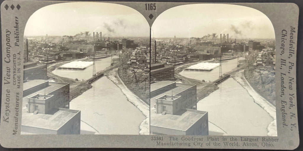 Stereoscopic view of a cityscape with buildings and a river, labeled 'Keystone View Company'.