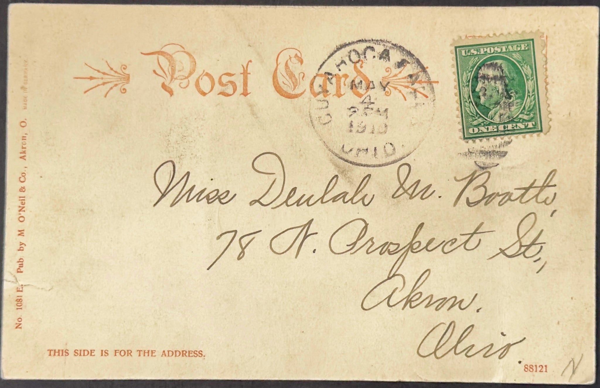 Vintage postcard with postage stamp and envelope details