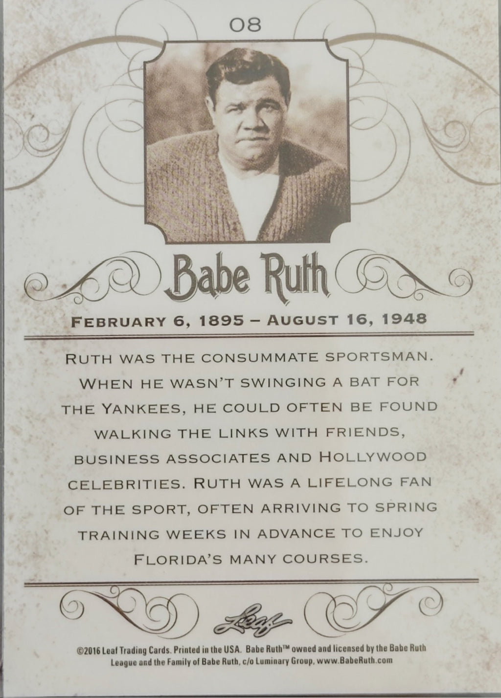 Card featuring a portrait of Babe Ruth with biographical text on a decorative background