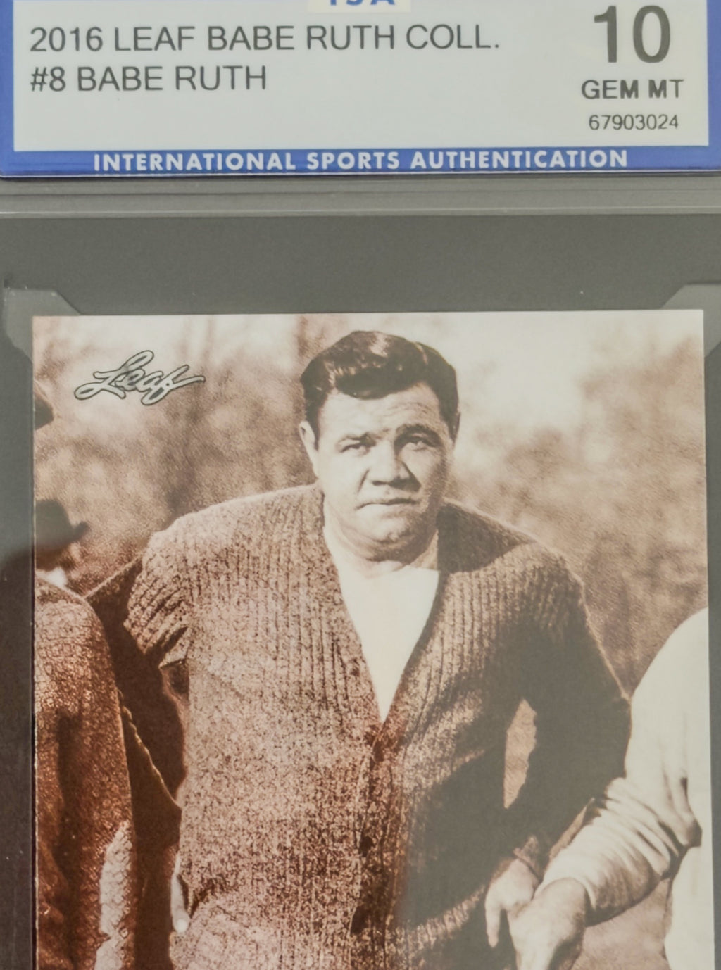 Vintage sports card of Babe Ruth with 'Leaf' branding and authentication details.