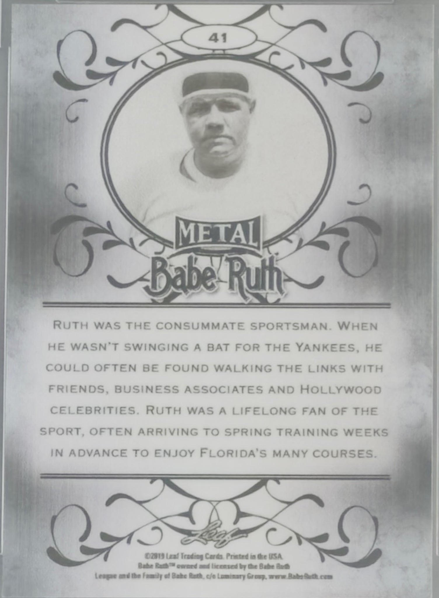 Baseball card featuring Babe Ruth with decorative elements and text.