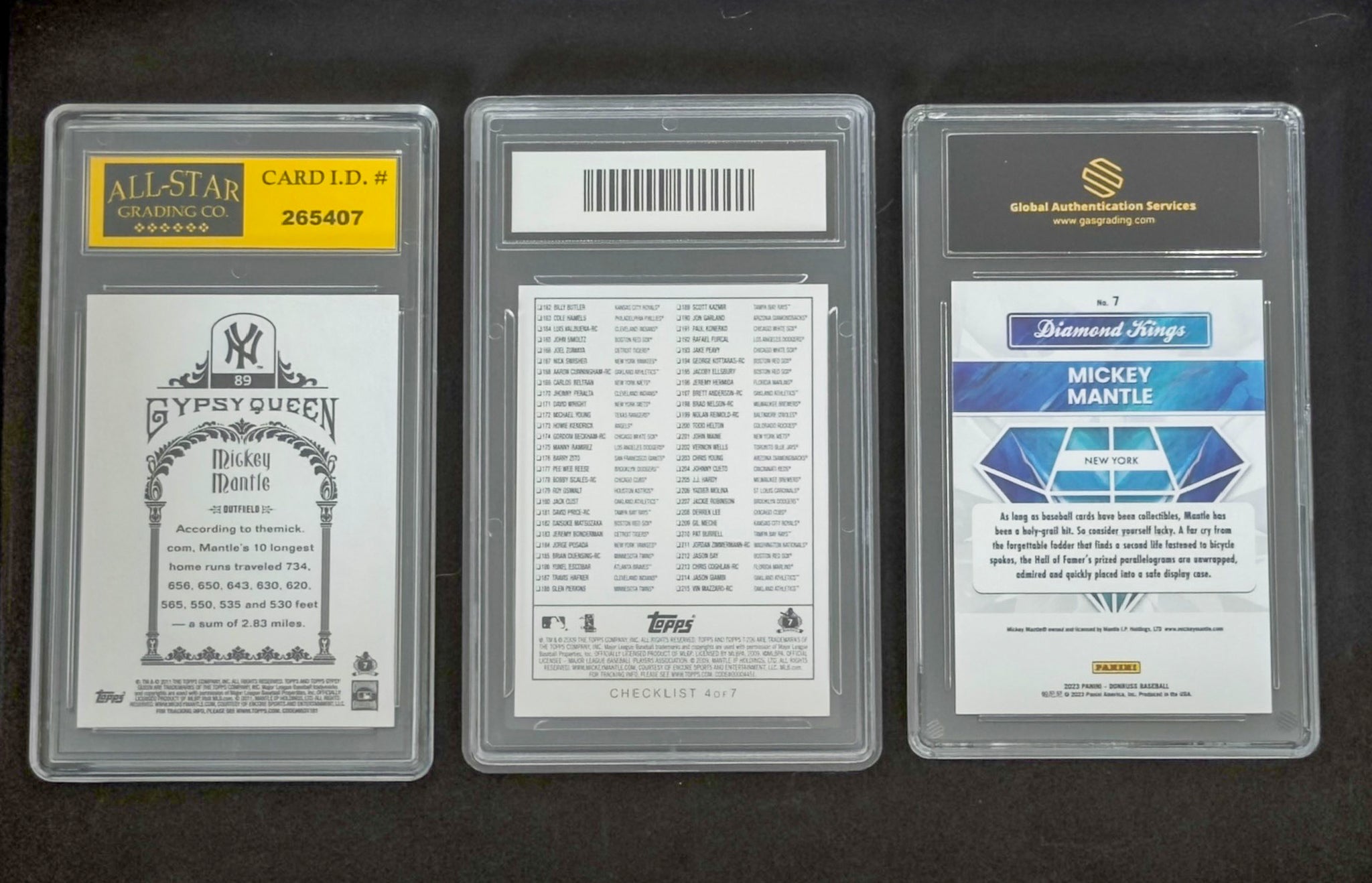 Three trading card packs with visible branding on a dark background