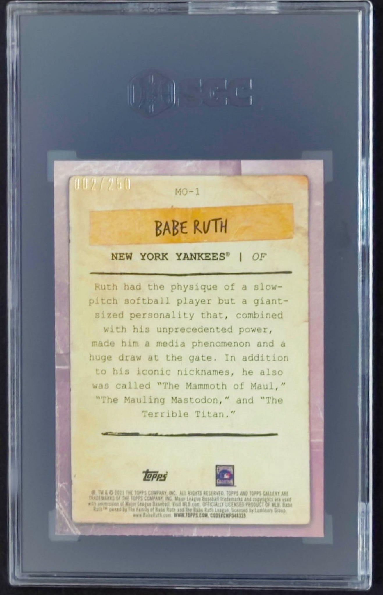 Baseball card of Babe Ruth in a protective case