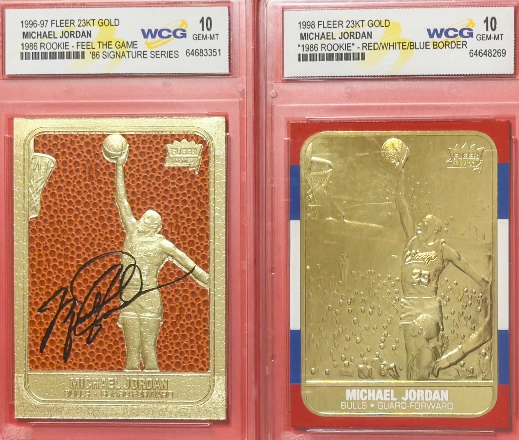 Two gold trading cards of Michael Jordan in display cases with WCG and 10 rating labels.