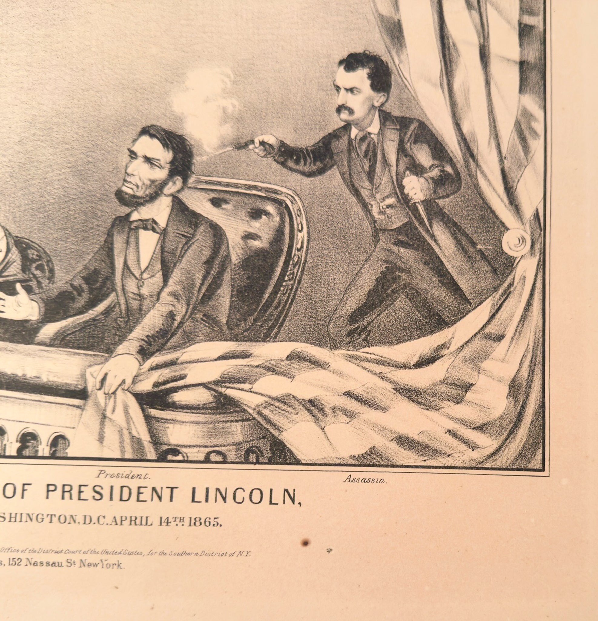 Engraving of Abraham Lincoln in a carriage with a man pointing a gun, labeled 'Assassin' on a sepia-toned background.
