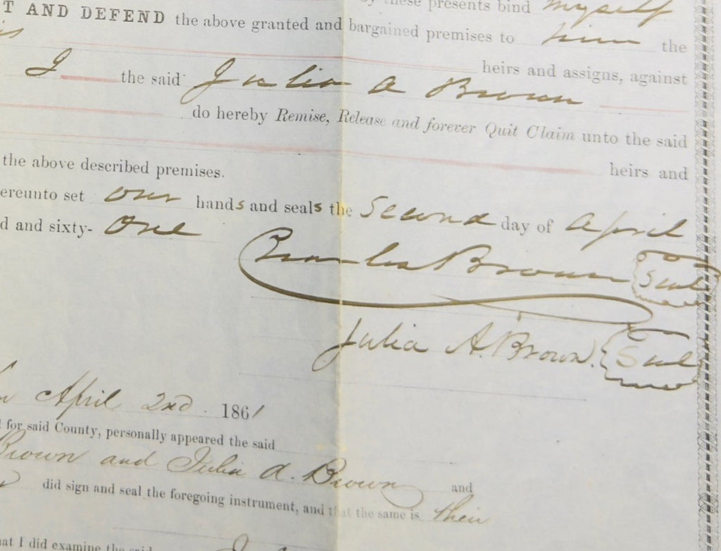 Document with handwritten text and a yellow stamp on a white background