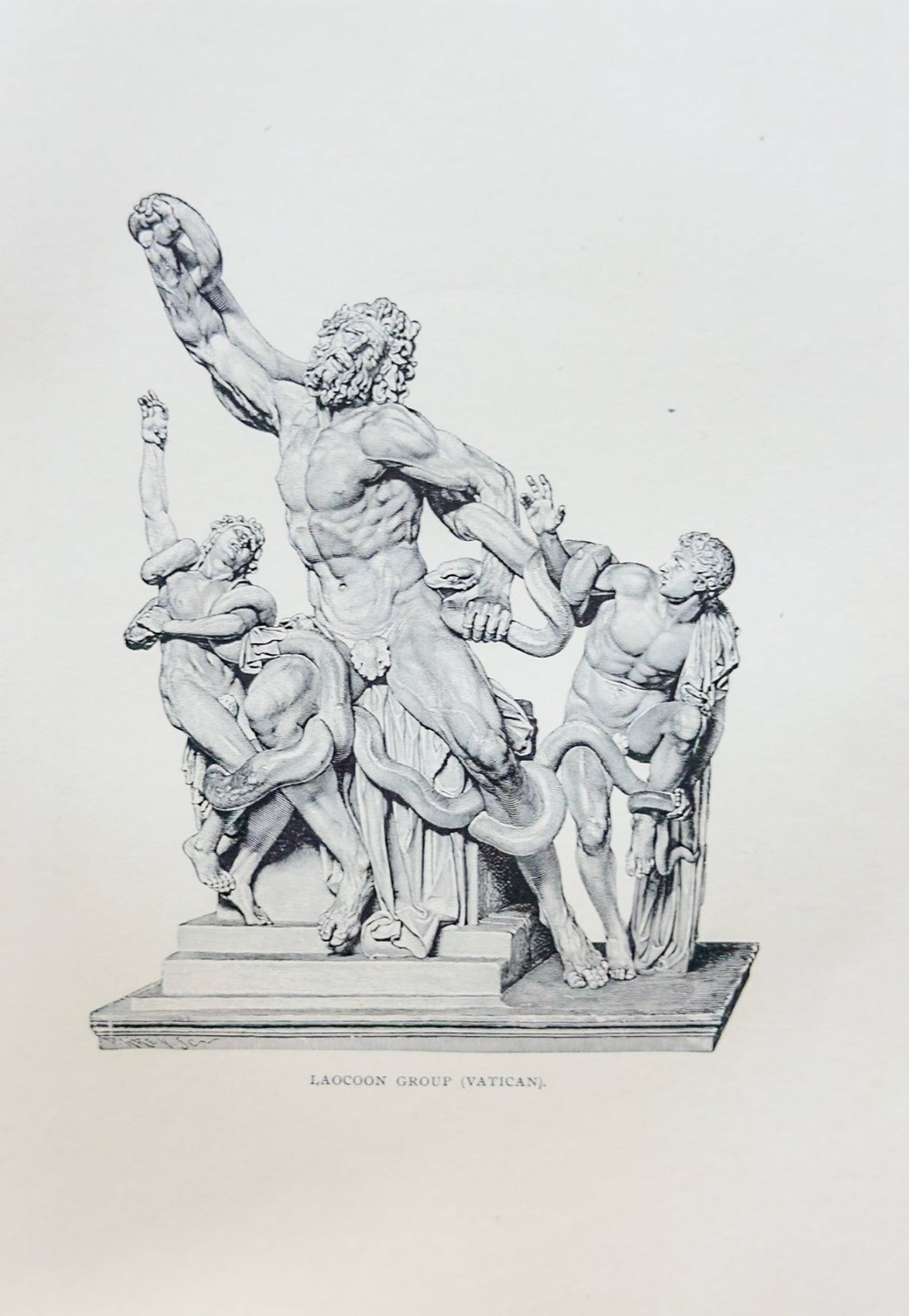 Black and white sculpture of a classical scene with figures on a pedestal